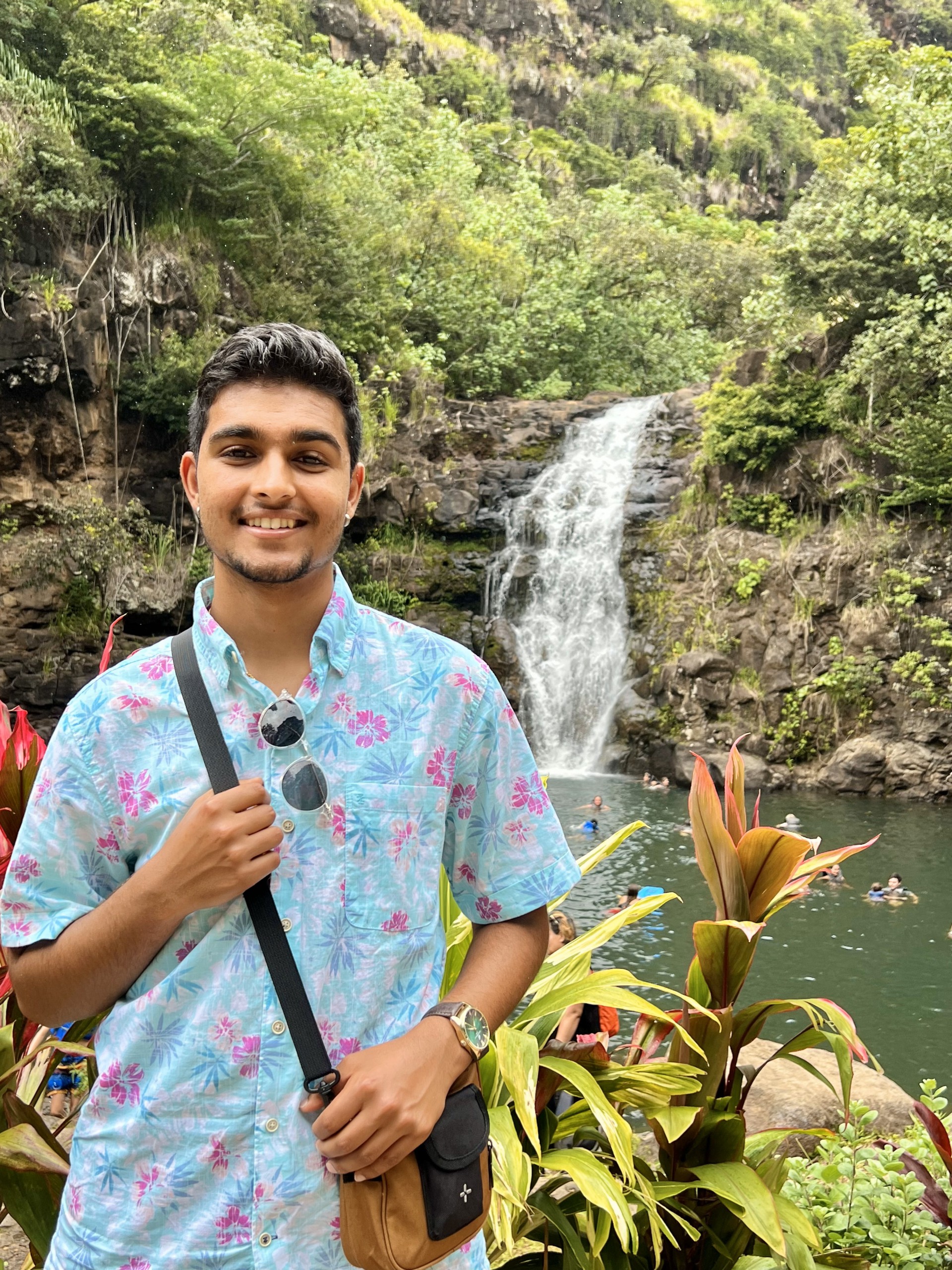 Prineet Anand in front of a waterfall